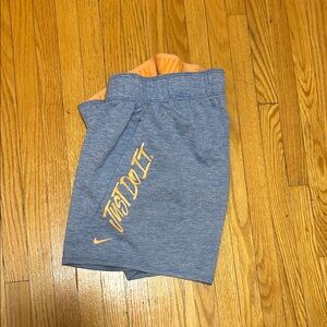 Nike Blue Heather Athletic Shorts with Peach/Orange band and “Just Do It”